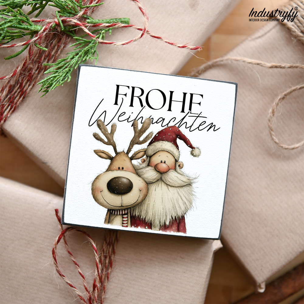 Miniblock Frohe Weihnachten, Holzschild mit Santa und Rudolph auf Geschenkpapier von Industryfy